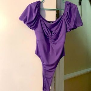 Fashion Nova purple or lavender bodysuit.